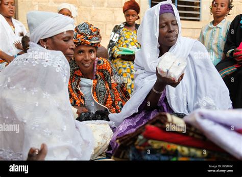 In Ouagadougou Burkina Faso Women Bring Ts Of Soap Clothing And