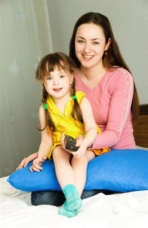 Mother And Daughter Watching Tv Stock Photo Image Of Embrace Child