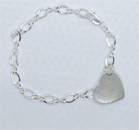 Sterling Silver Bracelet With A Heart Charm Etsy
