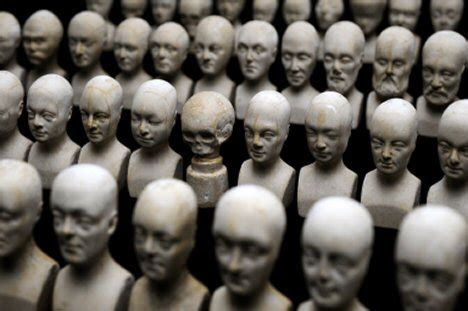 Sixty miniature heads used in phrenology - Mind Hacks