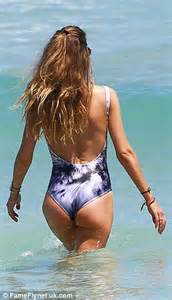 doutzen kroes shows off killer body in swimsuit after returning to miami daily mail online
