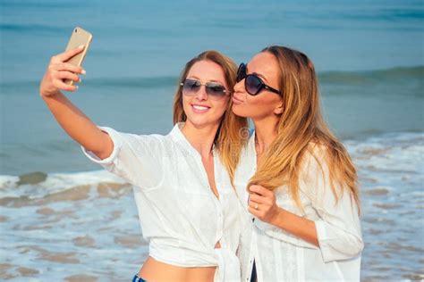 Two Women Do Selfie On Vacation On The Beach Stock Image Image Of