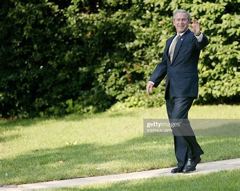 Us President George W Bush Waves As He Leaves The Oval Office At The