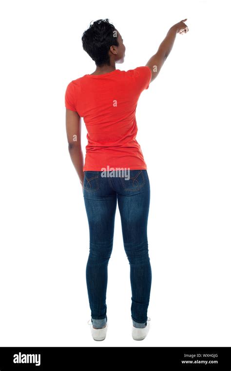 Back Pose Of A Woman Pointing At Something Stock Photo Alamy