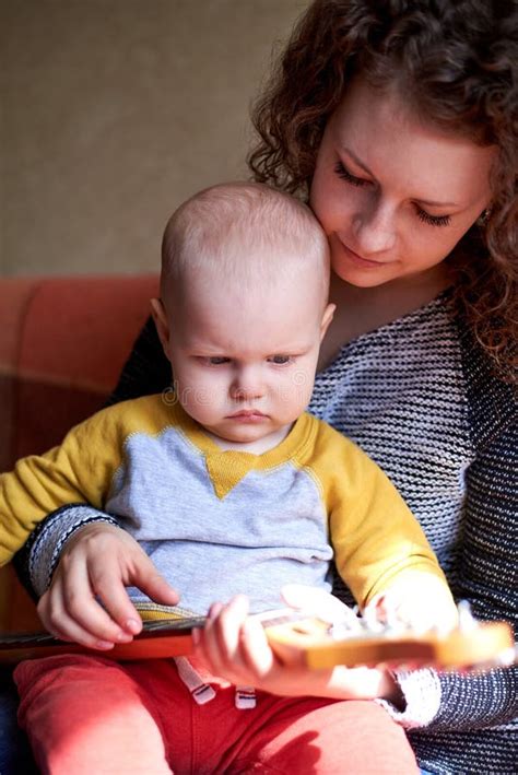 Mom Teaches Her Little Son To Play The Guitar Early Child Development