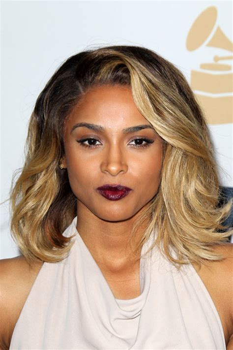 Looks unrecognizable with edgy blonde cut on set of new video. Ciara Wavy Honey Blonde Ombré Hairstyle | Steal Her Style