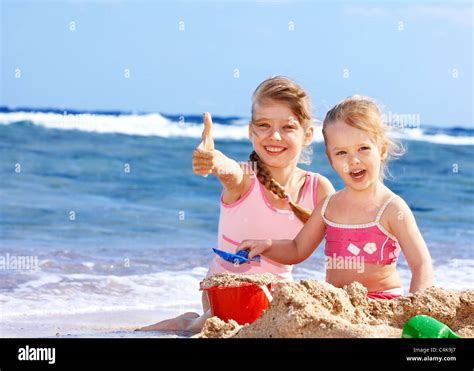 Children Playing On Beach Near Sea Stock Photo Alamy