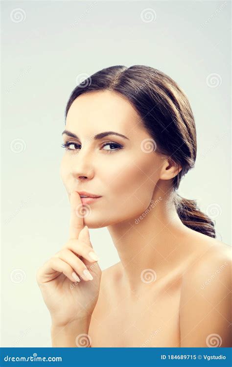 woman keeping finger on her lips stock image image of girl female 184689715