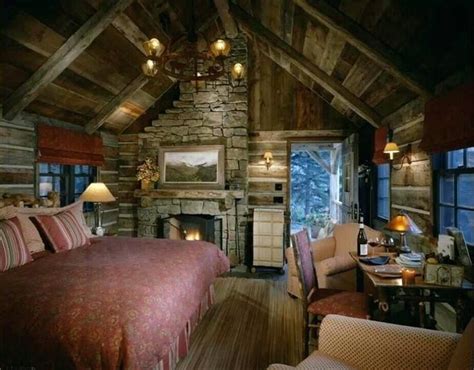 Small Log Cabin Interiors The Cozy Interior Of A Log Cabin Is Dimly Lit