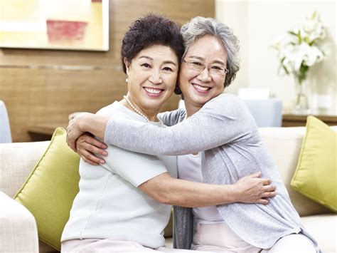 Senior Asian Women Hugging Each Other Stock Photo Image Of Korean