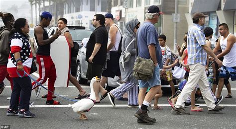 Californians Flock To Beaches In Orange County While La County Remains