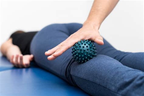 Free Photo Woman Getting Massage From Physiotherapist With Ball