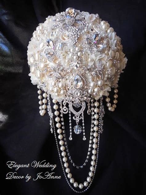 You won't look back at your wedding photos in 20 years and regret having a braid in. Ivory Cascading Pearl Brooch Bouquet, Deposit For A Large ...