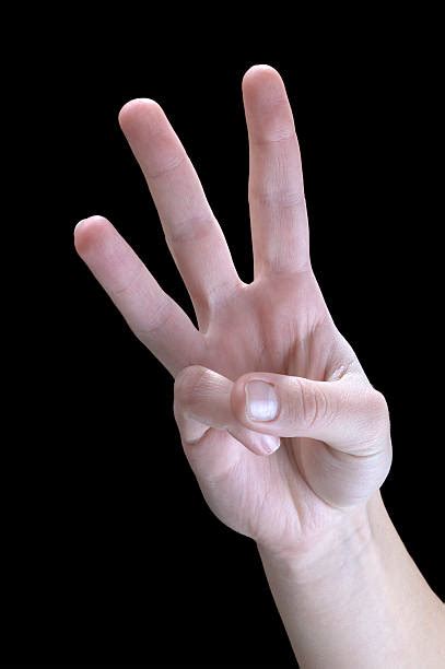 Hand With Three Fingers Up Stock Photos Pictures And Royalty Free Images
