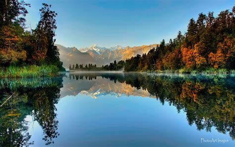 Each unit has a fully equipped kitchen with a. Lake Matheson - Lake in New Zealand - Thousand Wonders