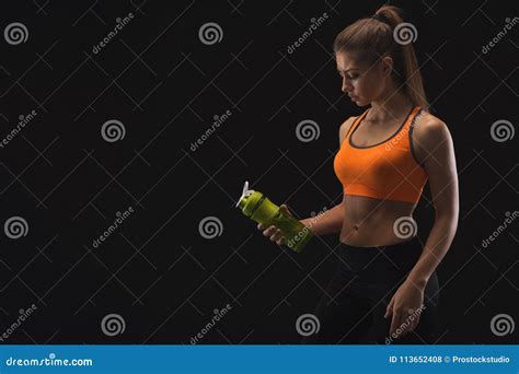 Female Bodybuilder Drinking Water After Workout Stock Photo Image Of