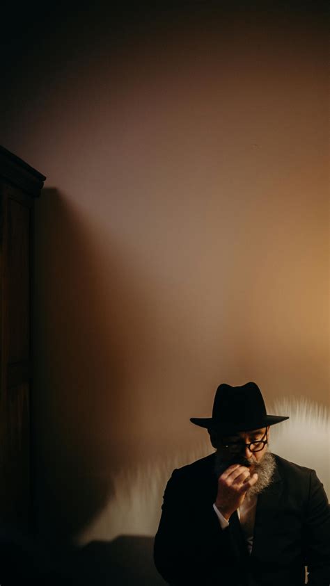 Photo Of An Old Man Wearing Fedora Hat · Free Stock Photo
