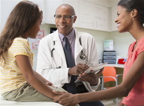 The female doctor has a special trea. Getting ready for back to school? Put well-child visits at ...