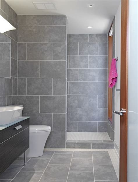 Modern small bathroom designing idea. Grey Tile Bathroom Ideas - Home Decorating Ideas