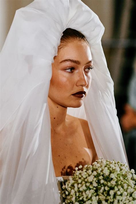 Gigi Hadid Rocks Jeremy Scotts Wedding Dress At Moschinos Spring