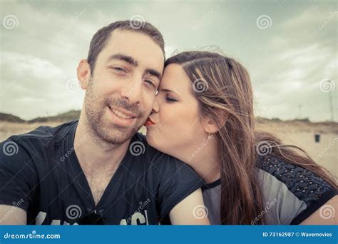 Young Couple Taking Selfie With Smartphone Or Camera At The Beach Stock Image Image Of