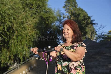 Hispanic Mature Woman With Her Electric Kick Scooter Modern Transportation Stock Image Image