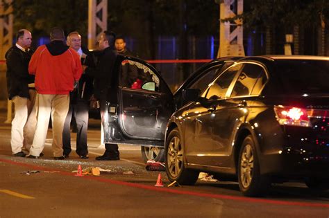 officer hit by car suspect shot on west side chicago tribune