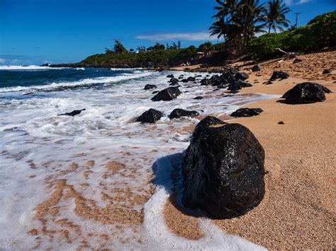 Ocean Waves Crashing On Lava Rocks On Hookipa Beach In Maui Hawaii