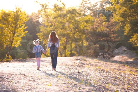 Mother And Daughter On A Walk Stock Image Colourbox