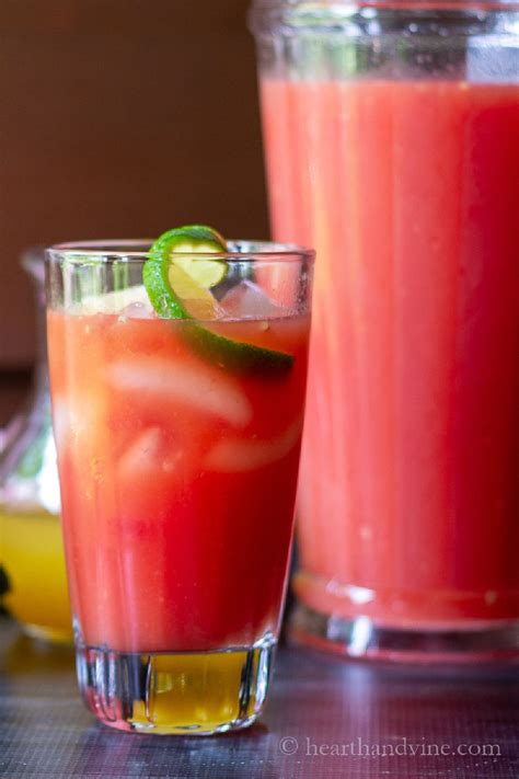 Glass And Pitcher Of Homemade Watermelon Rum Punch Rum Punch Recipes