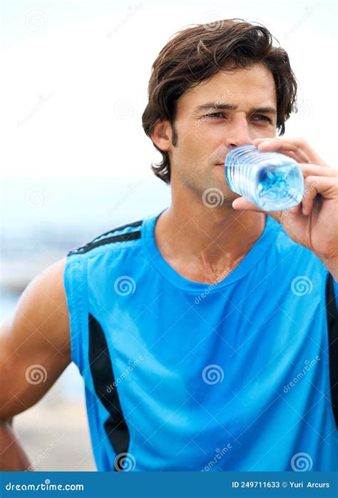 Ensure You Drink Enough Water During Training A Young And Fit Man