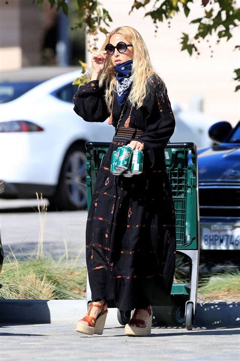 Tag your food obsession of the moment with #wholefoodsmarket. Rachel Zoe - In black maxi dress shopping at Whole Foods ...