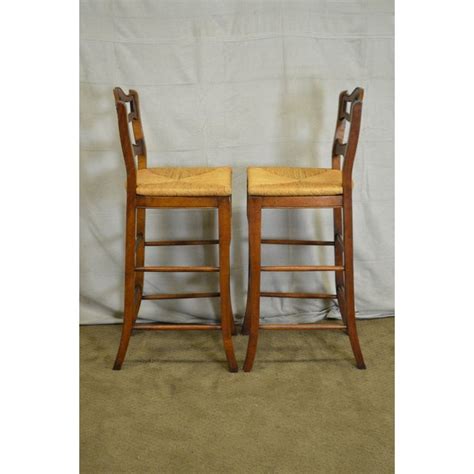 Solid wood construction with walnut finish. French Country Carved Rooster Ladder Back Rush Seat Bar ...