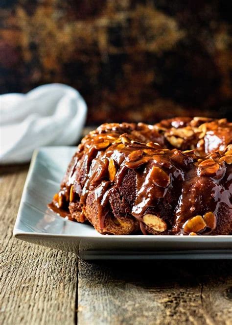Stir the quartered biscuits into the brown sugar mixture, making sure each piece is coated. Chocolate Caramel Monkey Bread - keviniscooking.com