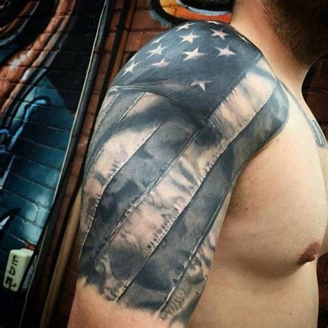 Grey bald eagle carrying american flag tattoo on shoulder. Pin on Popular Sleeve Tattoos