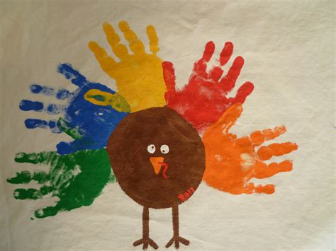 Handprint Turkey Placemats For Thanksgiving Handprint Crafts Autumn