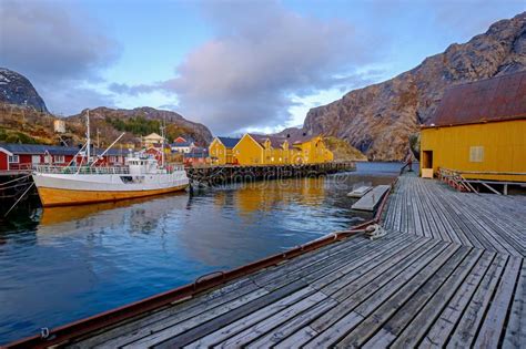 Nusfjord Authentic Fishing Village With Traditional Yellow And Red