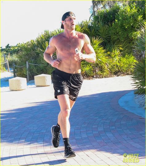 Logan Paul Goes Shirtless During Miami Beach Run With Girlfriend Nina Agdal Photo