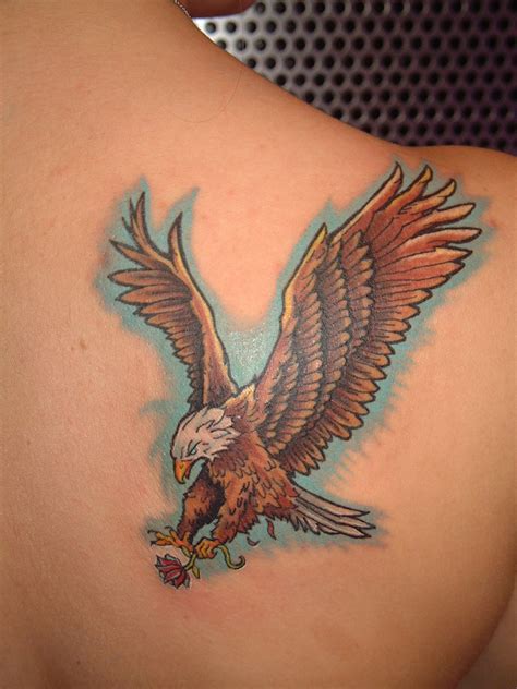Traditional Flying Eagle Tattoo On Man Left Side Rib