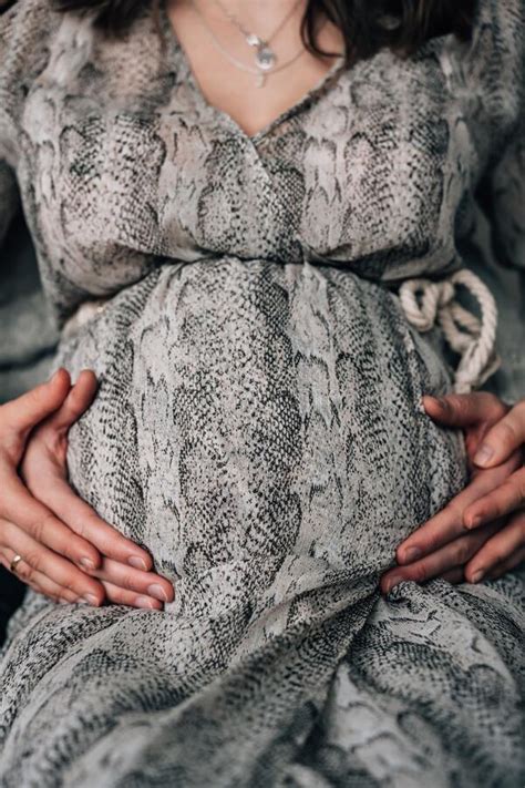 closeup of a belly of a pregnant woman with hugging hands stock image image of relationship