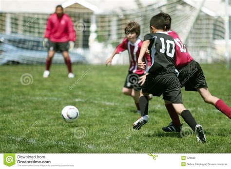 Boys Playing Soccer Stock Photo Image Of Game Green