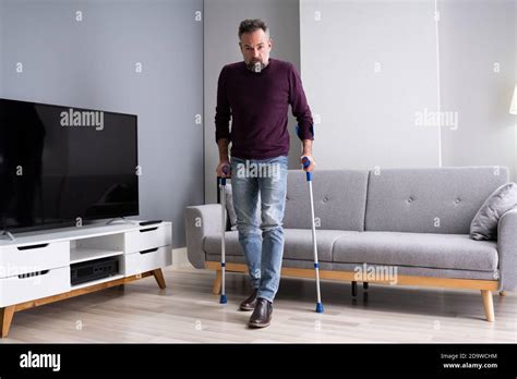Old Man On Crutches Hi Res Stock Photography And Images Alamy