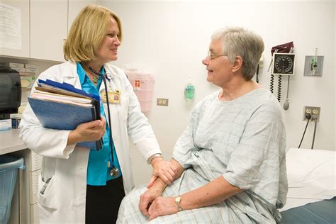 Nurse Practitioner With Patient