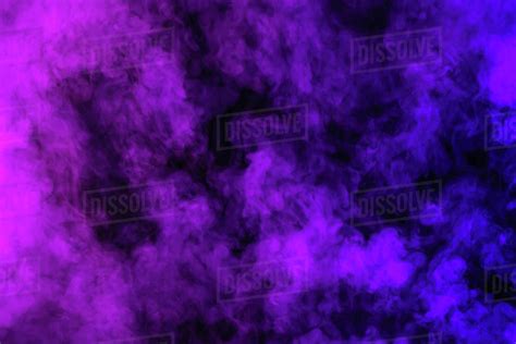 Purple Smoke On Abstract Black Background Stock Photo Dissolve