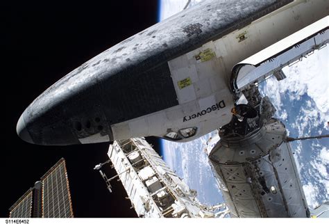 The Space Shuttle Discovery Docked To The Destiny Laboratory Of