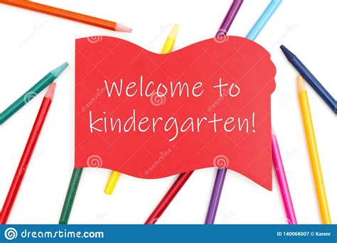 Welcome To Kindergarten Message On Red Wood Sign With Colored