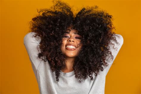 The natural hair texture became a recognizable style, and into the iconic cool 'party' hair we know today. Curling Afro Haircut - 45 Curly Hairstyles For Black Men ...