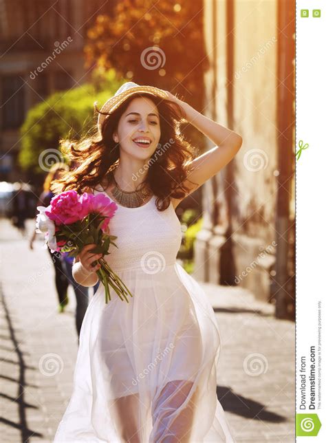 Outdoor Portrait Of Young Beautiful Happy Smiling Lady Walking On The