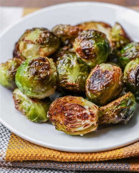 Many people have a negative association with them, since brussels sprouts can be bland when only boiled or steamed. Oven Roasted Brussel Sprouts (+VIDEO) | Lil' Luna