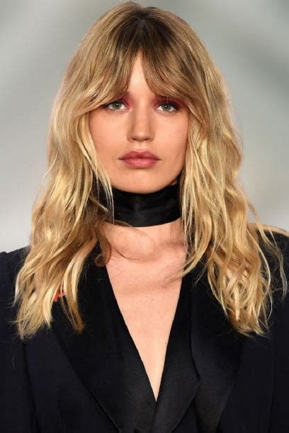 This hairstyle makes for an amazing visual with side swept bangs and tousled layers. Long hairstyles with bangs 2021-2022 - Hair Colors